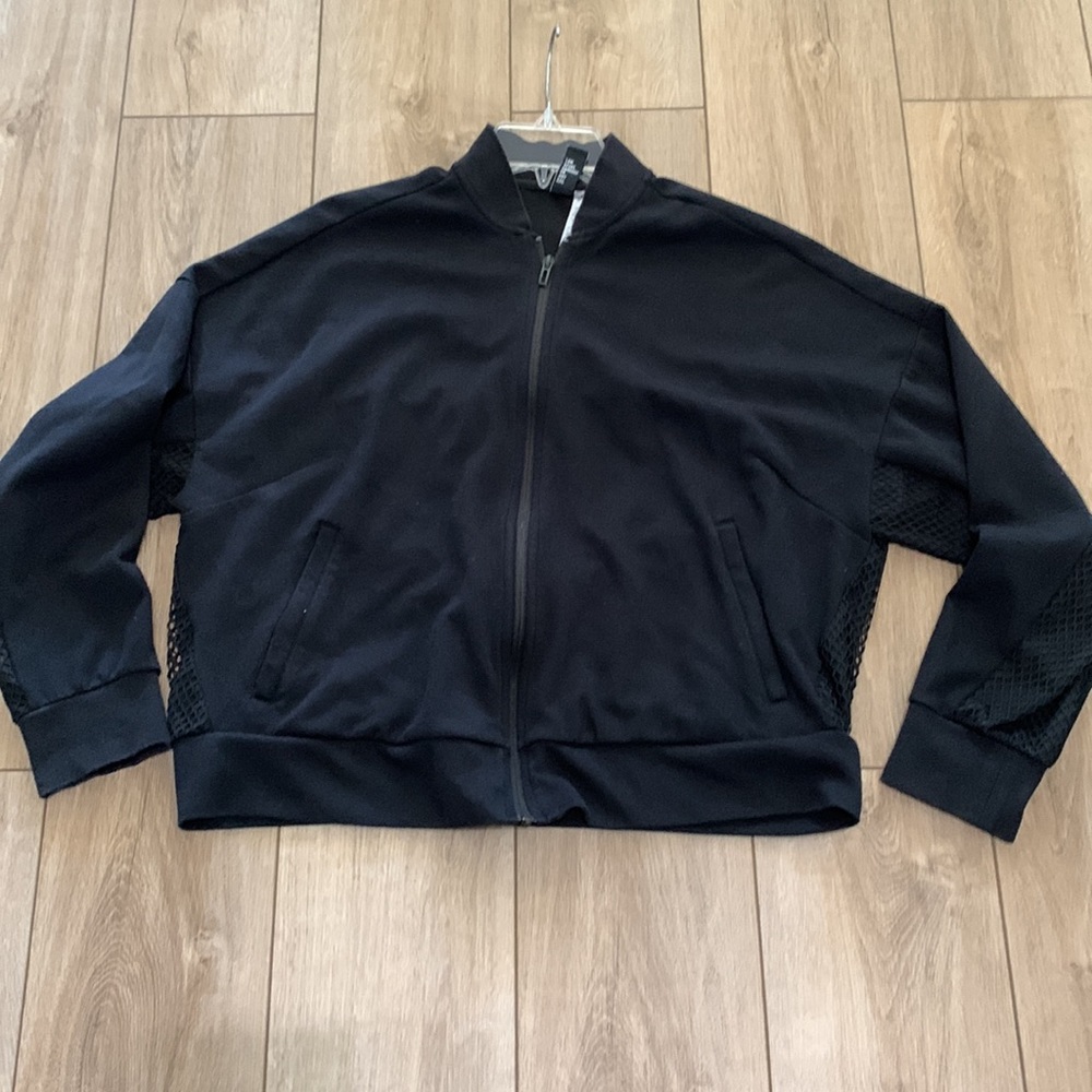 Adidas Women’s zip up light weight jacket. GUC